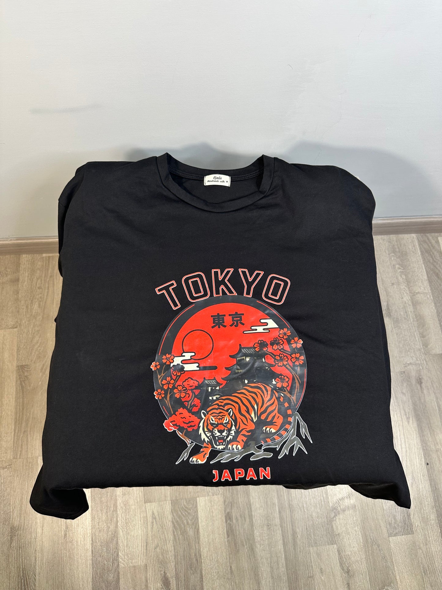 MAGLIA ROCK CON TAGLIO LATERALE