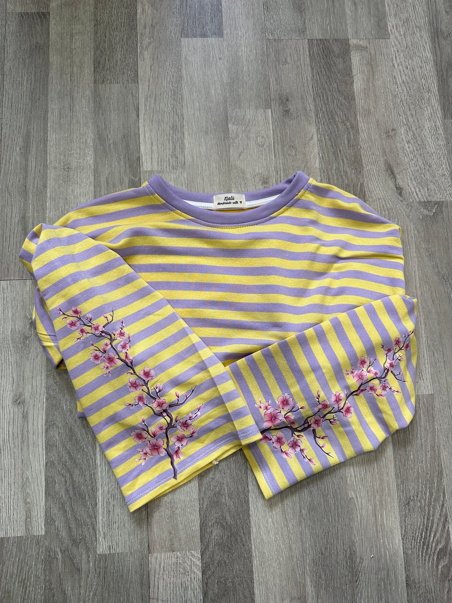 MAGLIA A RIGHE CON SCHIENA NUDA