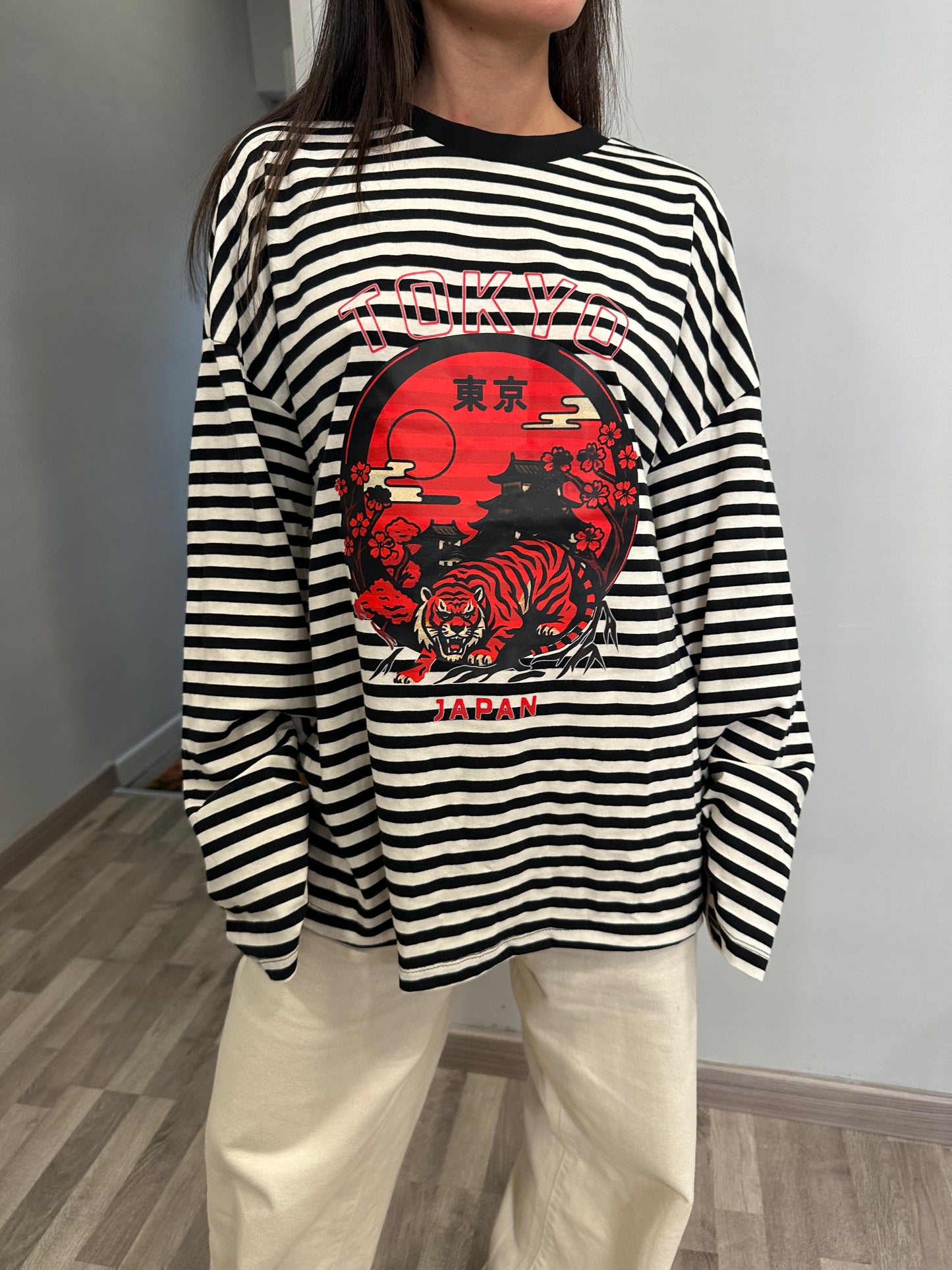 MAGLIA A RIGHE CON SCHIENA NUDA